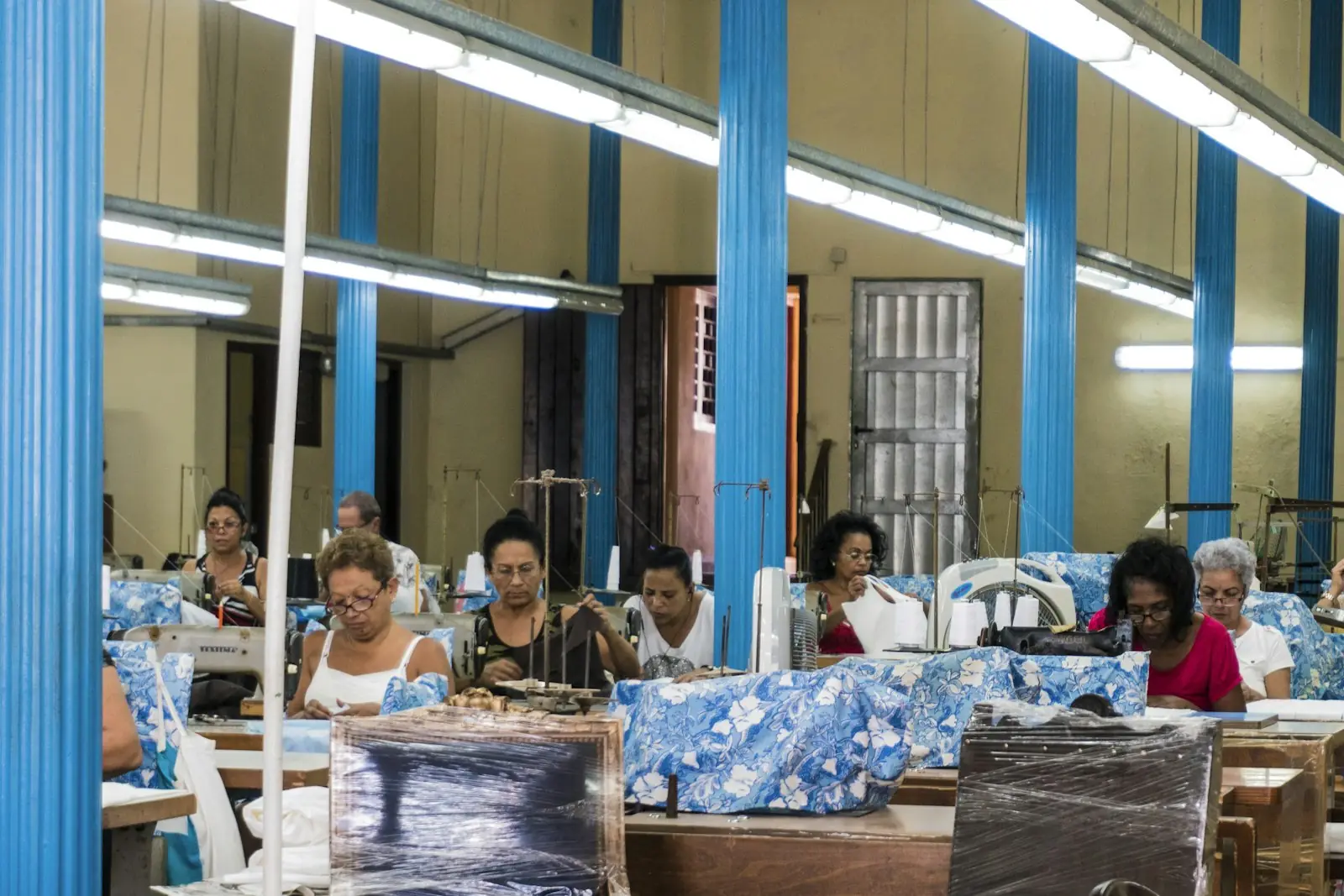 Garment workshop with rows of sewing machines